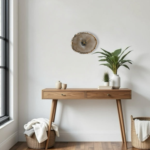 a wooden table with a potted plant on top of it