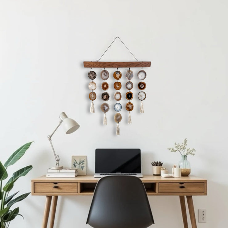 Handcrafted Umber Uma Agate Wall Hanging – Boho Wall Décor featuring natural agate slices, wood mount, brass wire or leather cording, and silk tassels.