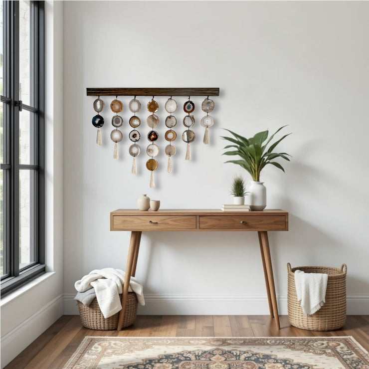 Handcrafted Umber Uma Agate Wall Hanging – Boho Wall Décor featuring natural agate slices, wood mount, brass wire or leather cording, and silk tassels.