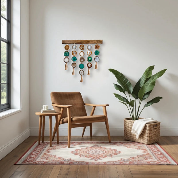 a room with a chair and a potted plant